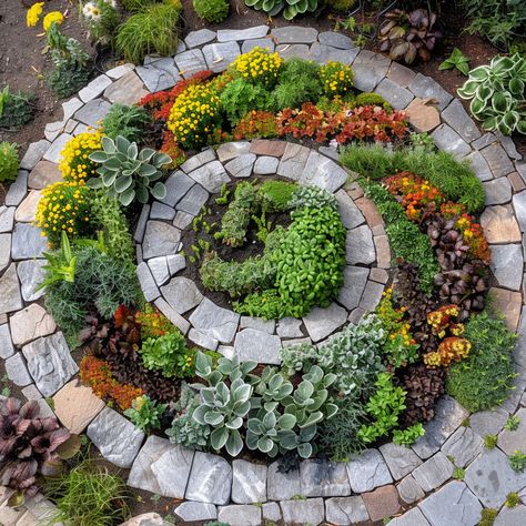 🌿🌈 Spiral Herb Garden with Colorful Culinary Herbs! 🌟✨ This innovative garden design features a spiral structure that maximizes space and provides optimal growing conditions for a variety of culinary herbs. The spiral shape creates different microclimates, allowing you to grow a diverse range of colorful and fragrant herbs in a compact area.🍃 Spiral Flower Bed, Backyard Raised Garden, Garden Spiral, Herb Spiral, Spiral Garden, Spiral Tree, Round Garden, Gardening Guide, Pathway Landscaping