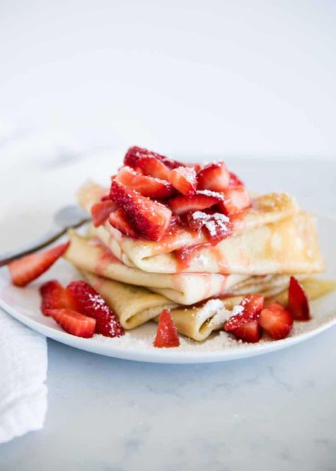 Learn how to make strawberry crepes in just 15 minutes! The batter is easily made in the blender and then filled with a simple 2-ingredient strawberry sauce. These make the perfect breakfast or dessert! Strawberry Crepe Filling, Crepes Strawberry, Strawberry Crepes Recipe, Canadian Breakfast, Crepe Filling, Best Crepe Recipe, Breakfast Strawberry, Dessert Crepes, Crepe Ingredients