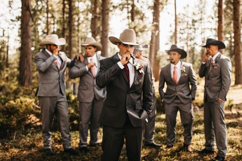 Groomsmen photo ideas with cigars and cowboy hats Country Western Groom Attire, Groomsman Cowboy Attire, Groomsmen Cowboy Hats, Groom Attire Cowboy, Groomsmen With Cowboy Hats, Groomsmen Attire Cowboy Hat, Cowboy Wedding Groom Attire, Suits And Cowboy Hats Wedding, Suits With Cowboy Hats