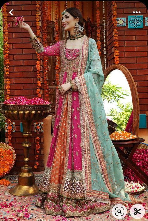 Mehndi Bridal Frocks, Colorful Mehendi Outfits, Pakistani Mehndi Outfit For Bride, Colourful Mehndi Outfits, Haris Shakeel Mehndi Dresses, Pakistani Mehndi Wedding Dresses, Mehendi Wear Outfit, Orange And Pink Mehndi Outfit, Mendi Outfits For Bride