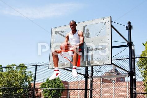 Basketball player sitting in hoop Stock Photos #AD ,#sitting#player#Basketball#Photos Sitting On Basketball Hoop, Basketball Court Photoshoot, Basketball Photoshoot, Basketball Shoot, Court Photoshoot, Basketball Senior Pictures, Basketball Rim, He Got Game, Men Fashion Photoshoot