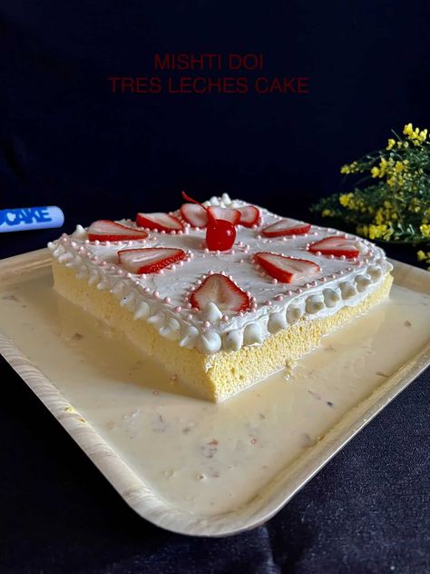 A tres leches cake is a sponge cake soaked in three kinds of milk, condensed milk, evaporated milk and full cream milk. But I made it with a twist, I replaced condensed milk with Bengali Mishti Doi.Tried to match Indian and Western in one cake. Milk Cakes, Mishti Doi, Leches Cake, Milk Cake, Vintage Dessert, Tres Leches Cake, One Cake, 2000 Calories, Delicious Donuts