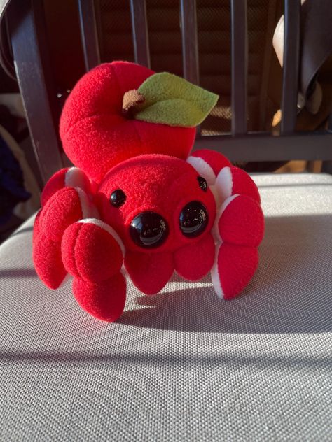 This fresh picked, hand-sewn cutie is ready for you! 🍎🕷 Each 6 inches of soft fleece is hand made and stuffed with polyester filling. Small and squishable, with a loop on the booty so they can hang out anywhere.  Disclaimer: NOT intended as a dog toy Small safety eyes can be a choking hazard if removed or dislodged. Sewn Plushies, Weird Stuffed Animals, Soft Toys, Plushie Display, Spider Plush Pattern, Red Plushie, Red Crochet Plushie, Spider Plush, Fluffy Spider Plushie