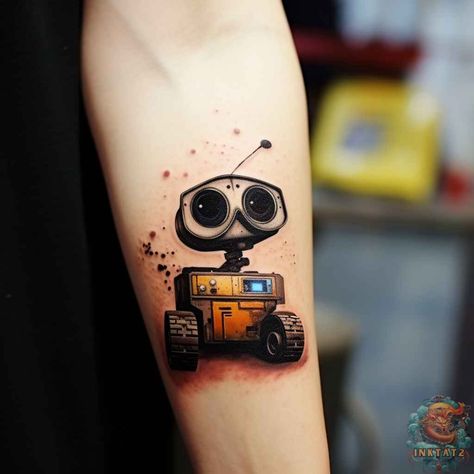 44 Wall-E Tattoos: A Look at the Growing Trend in Pop Culture - inktat2.com Walle Tattoo Disney, Inside Out Tattoo Disney, Walle And Eve Tattoos, Wall E And Eve Tattoo, Wall E Tattoo, Small Disney Tattoos, Movie Character Tattoos, Eve Tattoo, Walle Y Eva