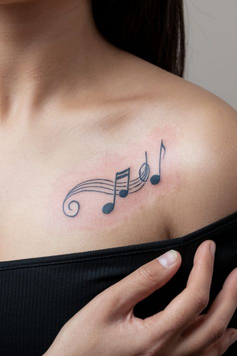 Music note with a twist collarbone tattoo Music Chest Tattoo Female, Cute Music Note Tattoos, Couple Tattoos Music, Music Minimalist Tattoo, Music Aesthetic Tattoo, Simple Music Tattoo, Tattoos Music Notes, Tattoos For Music Lovers Unique, Cello Tattoo