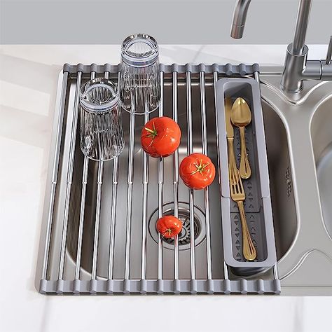 Roll up dish rack use for over the sink up to 21 inches width. Its size is 12.8 - 23.3" L x 12.8" W inches. Expandable in length of dish rack to fit your sink. The collapsible dish drying rack come with a free storage tray, you can place it with a variety of knives and forks, spoons, small fruits and spones. Besides, it can be removable and you can drying your large silverware between the gap. Kitchen Sink Rack, Sink Drying Rack, Home Decor And Organization, Sink Cover, Sink Dish Rack, Kitchen Sink Storage, Finds On Amazon, Sink Sizes, Over Sink