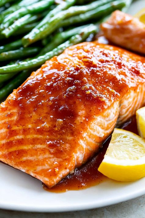 Looking for a delicious and healthy dinner idea? Try this irresistible Brown Sugar Baked Salmon recipe that's perfect for any night of the week. This dish combines the sweetness of brown sugar with the savory goodness of baked salmon. It's simple to make, yet full of flavor, making it a great choice for busy weeknights or special occasions. Serve this mouthwatering dish with your favorite side dishes and enjoy a meal that will impress your family and friends. Bake Salmon In Oven Recipes, Salmon Rub Recipe Brown Sugar, Brown Sugar Salmon Baked, Recipe For Baked Salmon, Salmon Recipes Baked Brown Sugar, Salmon Glaze Recipes Brown Sugar, Baked Salmon Fillets Oven, Brown Sugar Salmon Recipes, Vegetable Aesthetic