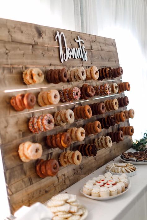 Donut Displays For Weddings, Donut Graduation Party Ideas, Donut Wall Display, Fall Donut Wall, Donut Wall Graduation Party, Donut Bar Graduation Party, Grad Party Donut Wall, Donut Stand Display, Graduation Deserts Ideas