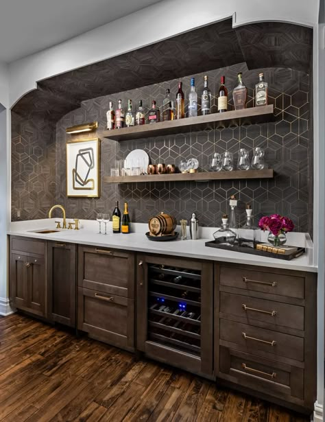 Orchard Drive Kitchen With Dark Cabinets And Light Counters, Built In Bar Bookshelf, Home Bar With Glass Shelves, Game Room Shelving Ideas, Bar With Shelves Above, L Shaped Wet Bar Basement, Built In Bar Next To Fireplace, Small Wine Bar Ideas, Bar With Open Shelving