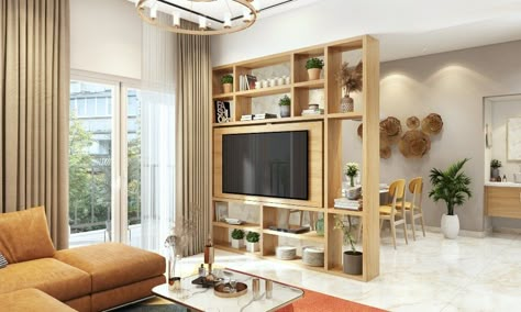 Space Saving Interior Designs | Storage Solutions | DesignCafe Rotating Tv Unit, Tv Partition, Divider With Tv, Room Divider With Tv, Rotating Tv Stand, Tv Stand Room Divider, Rotating Tv, Modular Furniture Design, Home Office Furniture Design