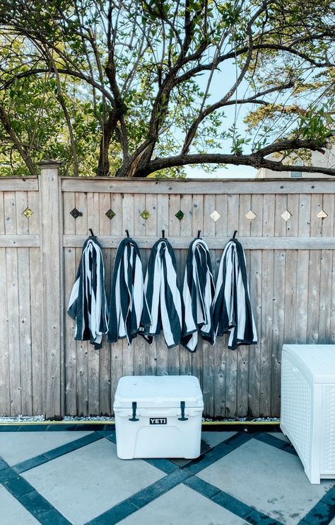 Friday Favorites- Outdoor Edition | Nesting With Grace | Summer landscaping, pool and outdoor furniture ideas for an eclectic coastal home. #outdoorliving #patio #pool Pool Bathroom Storage, Backyard Pool Furniture Ideas, Outdoor Pool Furniture Ideas, Pool Accessories Ideas, Pool Deck Furniture Ideas, Pool Furniture Ideas, European Eclectic, Pool Area Decorating Ideas, Outdoor Towel Hooks