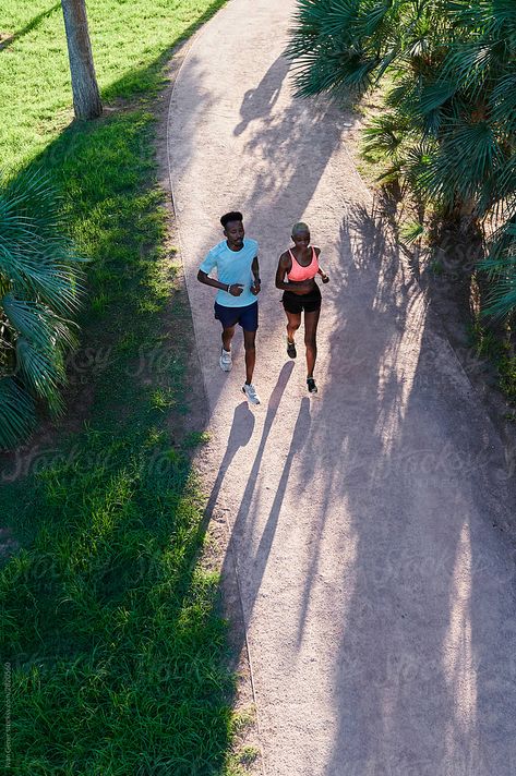 Two fit young African American friends running together along a path in a park on a sunny afternoon Running Together, Jogging Track, Sunny Afternoon, Recreational Activities, Quick Sketch, A Park, African American, Jogging, Royalty Free Stock Photos