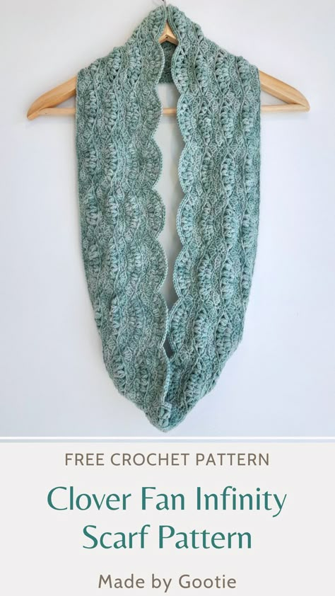 This beautiful lightweight crochet infinity scarf pattern features a variation of the Clover Fan stitch. The scarf is worked in the round, creating a romantic look with a delicate lacy pattern. The free infinity scarf crochet pattern is easy to follow. #crochetinfinityscarves #infinityscarf #crochetinfinityscarf #infinityscarffreepattern #crochetscarf #scarffreepattern #lacecrochetscarf #crochetscarfdiagram Crochet Scarf Lightweight Yarn, Feminine Crochet Scarf, Crochet Delicate Scarf, Light Crochet Scarf Pattern Free, Lacy Infinity Scarf Crochet Pattern Free, Crochet Lightweight Scarf, Dainty Crochet Scarf, Easy Snood Crochet Pattern, Free Crochet Pattern Infinity Scarf