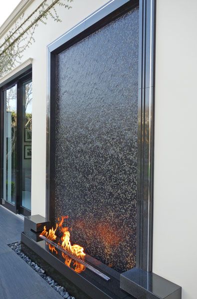 Outdoor Water Wall Feature, Outdoor Wall Water Features, Granite Water Feature, Water Walls Outdoor, Waterfall Feature Wall, Fire And Water Feature Outdoor, Modern Water Feature Entrance, Water Feature Wall Outdoor, Outdoor Mirror Ideas