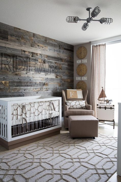 This subtle travel-themed nursery features a driftwood wall fused with modern details like an acrylic crib to create the perfect modern meets rustic baby room that's serene and inviting. Gender Neutral Bedroom Kids, Rustic Baby Boy Nursery, Neutral Kids Bedroom, Travel Theme Nursery, Perfect Nursery, Baby Nursery Themes, Nursery Room Design, Baby Boy Room Nursery, Nursery Room Boy