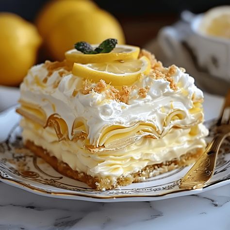 This No-Bake Lemon Eclair Cake is a refreshing and easy-to-make dessert that combines the tangy flavor of lemon with the light, airy texture of Cool Whip and the satisfying crunch ... Learn more Lemon Desserts For A Crowd, Lemon Eclair Cake No Bake, Lemon Cool Whip Frosting, Lemon Sheet Cake With Glaze, No-bake Lemon Eclair Cake Recipe, Lemon Delight Dessert, Lemon Angel Food Cake Recipes, Lemon Cake Desserts, Eau Claire Dessert