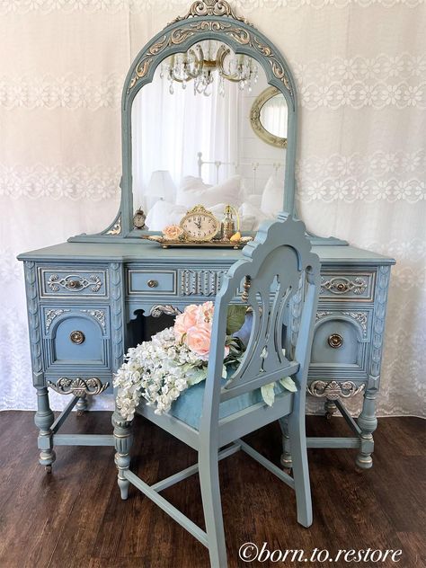 This gorgeous antique vanity is hand painted in a lovely dusty blue, sealed and highlighted with a soft gold.  It has a glamorous finish with a slight vintage look.  The five dovetail drawers are very well built, the hardware are original  The beautiful to the piece . The original mirror is aged with the characteristic of an antique mirror that is 92 years old with some small blemished just enough to give the mirror true charm while no detracting from your everyday use and add character.   The b Vintage Furniture Vanity, Antique Vanity Bedroom, Blue Vanity Bedroom, Vanity Vintage, Vintage Blue Bedroom, Antique Vanity Makeover, Small Vanity Ideas, Lace Painted Furniture, Vinage Bed Dresser And Vanity Dresser