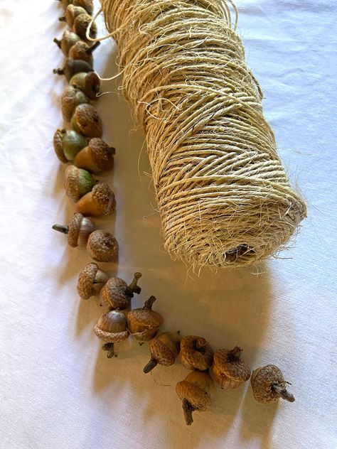 How to make acorn garland for fall - Wisconsin Magpie Halloween Acorn Crafts, Fall Nature Decorations, Acorn Wedding Decor, Fall Decor Natural Diy, How To Make An Acorn Necklace, Fall Pine Cone Decorations, Fall Nature Decor, Cottagecore Fall Decor Diy, Harvest Diy Decor