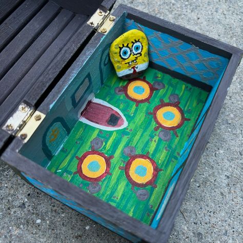 Painted this treasure chest box to look like the Krusty Krab . . . . . . #paint #paints #painting #paintings #art #arts #artsy #artstudio #artist #artistic #acrylic #acrylicpainting #acrylicart #acrylicpaint #box #boxes #paintedbox #spongebob #sponge #krustykrab #bikinibottom #spongebobpainting Unhinged Memes, The Krusty Krab, Krusty Krab, Spongebob Painting, Stash Box, Cute Paintings, Paintings Art, Cute Box, Painted Boxes