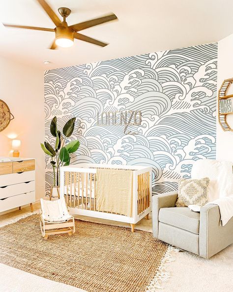 Source: Instagram / @melmarvelous_ All this mama needs is to play soundtracks of waves crashing on the shore, and this will be the best nursery! The room feels so comforting, from the waves accent wall to the natural materials from each decor item. The textured rug does not just add warmth to the space but also ties the room’s overall look. Baby Boy Nursery Wave Wallpaper, Waves Nursery Wall, Ocean Wave Nursery, Waves Wallpaper Nursery, Nursery Ideas Ocean Sea Theme, Surf Nursery Decor, Modern Ocean Themed Nursery, Waves Nursery Theme, Water Themed Nursery Ideas