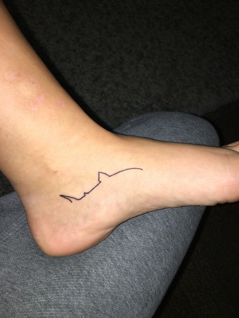 #tattoo #ink #shark #outline #linework #greatwhite #ocean #marinelife #capecod #foottattoo #ankletattoo Line Shark Tattoo, Mini Shark Tattoo, Ocean Line Tattoo, Shark Tattoo Minimalist, Shark Line Tattoo, Linework Shark Tattoo, Tiny Shark Tattoo, Minimalist Shark Tattoo, Shark Outline Tattoo