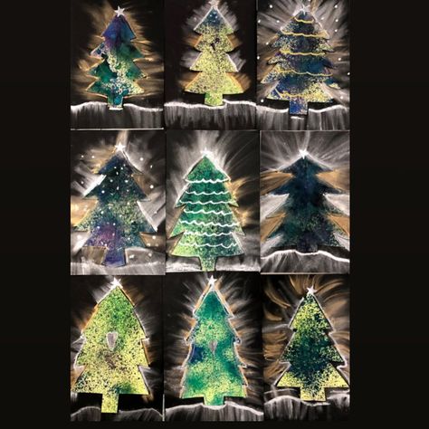 Lauralee Chambers on Instagram: “Happy Sunday from the Winter forest. We folded and cut our painted paper into symmetrical trees and glued them to black paper. Metallic…” Winter Art Lesson, Christmas Art Projects, December Crafts, 2nd Grade Art, Winter Art Projects, Classroom Art Projects, Christmas Arts And Crafts, Elementary Art Projects, Homeschool Art