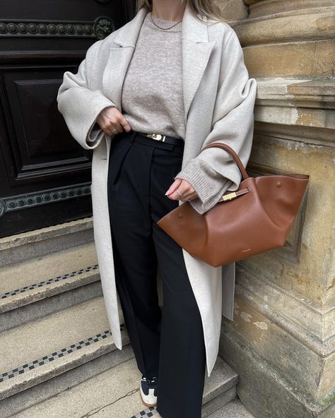 Her first outing 🥹💼🤎 outfit details below & linked on my @shop.ltk . Bag - @demellierlondon *pr Jumper & trousers - @arketofficial *pr Coat - old @hm Trainers - @adidas samba Belt - @amazonfashioneu Sunglasses - @ysl . . Transitional outfits, adidas sambas, black trousers, Demellier New York midi bag, minimal outfits . . #demellier #demellierlondon #adidassamba #adidassambaclassic #sambas #arket #arketofficial #blacktrousers #tanbag #brownbag #leatherbag #streetstyleluxe #streetstyleins... Demellier Bags Outfit, Demellier New York, Demellier London, Sambas Black, Midi Outfits, Transitional Outfits, Trainers Adidas, New York Outfit, Outing Outfit