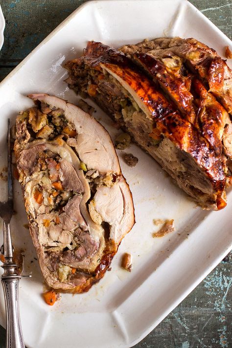 NYT Cooking: A well-prepared turducken is a marvelous treat, a free-form poultry terrine layered with flavorful stuffing and moistened with duck fat. When it's assembled, it looks like a turkey and it roasts like a turkey, but when you go to carve it, you can slice through it like a loaf of bread. In each slice you get a little bit of everything: white meat from the breast, d... Easy Chicken Leg Recipes, Dinner Ideas Easy Chicken, Air Fryer Chicken Meatballs, Turducken Recipe, Preparing A Turkey, Bread Photo, Paul Prudhomme, Duck Fat, Dark Meat