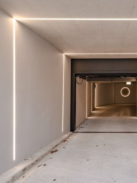 Cabrio House: where metallic paint and resin flooring turn a garage into a welcoming entryway Modern Garage Interior Design, Luxury Garage Underground, Minimalist Garage, Open Concept Kitchen Dining Room, Garage Aesthetic, Car Show Room, Hidden Outlets, Dubai Islands, Damac Hills