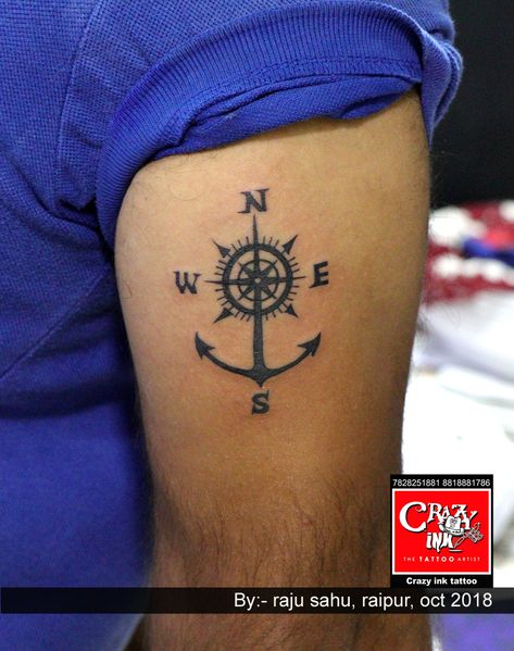 Awesome black and grey realistic tattoo style of Anchor and Compass motive done by tattoo artist Raju sahu from India, Raipur.. #anchor #compass #anchortattoo #compasstattoo #mentattoo #womentattoo #blackgreytattoo #india #raipurartist #tattooart #tattoo #creativity #tattooidea Native American Tattoo Drawings, Geometric Compass Tattoo, Geometric Compass, Designer Tattoo, Travel Tattoo Ideas, Around Arm Tattoo, Travel Tattoos, Compass Tattoo Design, Feather Tattoo Design