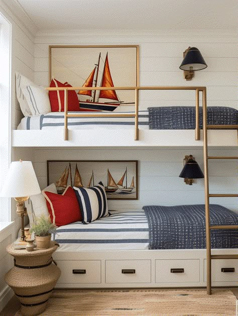 built in bunk beds with sailboat art and red and white and blue striped accent pillows Bunk Bed Cottage Room, Nautical Room Ideas Interior Design, Hudson Bay Bedroom, Navy Bunk Beds, Coastal Bunk Room Ideas, Coastal Bunk Beds, Kids Beach House Bedroom, Boys Lake House Bedroom, Hamptons Cottage Interior