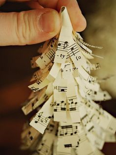 How to Make Sheet Music Christmas Trees : Page 02 : Decorating : Home & Garden Television Sheet Music Christmas, Sheet Music Crafts, Music Christmas, Diy Music, Music Ornaments, Christmas Sheet Music, Sheet Music Art, Music Crafts, Paper Sheet