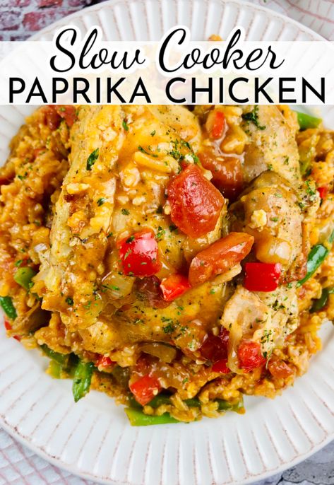 With flavorful rice cooked in the same sauce as the chicken, Slow Cooker Paprika Chicken is a complete and hearty meal! Comfort food is the best kind of food. Crock Pot Paprika Chicken, Slow Cooker Paprika Chicken, Chicken Maryland Recipes Slow Cooker, Crockpot Paprika Chicken, Slow Cooker Chicken And Peppers, Slow Cooker Chicken Paprikash, Paprika Chicken And Rice, Slow Cooker Chicken And Rice Recipes, Chicken Paprikash Slow Cooker