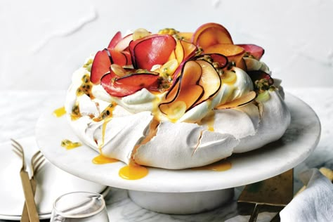 You can never go wrong with a pav. But you’ve also never had one quite like Yotam Ottolenghi’s. It’s guaranteed to please – and surprise – everyone. “Pavlova is among the best desserts to serve at a dinner party, as it brings the ‘wow’ factor but is also very forgiving.” Christmas Pavlova Recipe, Crazy Food Ideas, Fruit Based Desserts, Pavlova Toppings, Aussie Party, Pavlova Recipes, Delicious Magazine Recipes, Raspberry Pavlova, Christmas Pavlova