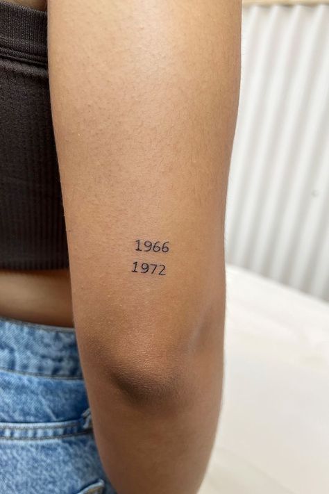 Birth Year Tattoo Arm, Small Years Tattoo, Small Year Tattoos, Cute Birthday Tattoos, Parents Birth Years Tattoo, Birthyear Tattoo On Arm, Dainty Birth Year Tattoo, Parents Year Tattoo, Two Dates Tattoo