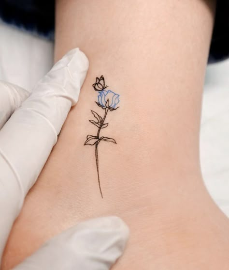 Line Tattoo Rose, Simple Fine Line Tattoo, Tiny Butterfly Tattoo, Key Tattoo Designs, Hamsa Hand Tattoo, Rose And Butterfly Tattoo, Butterfly With Flowers Tattoo, Blue Rose Tattoos, Saved Tattoo