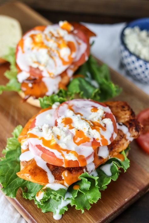 The Buffalo Chicken Sandwich is a classic staple that can easily be made at home using fresh ingredients! Done in less than 15 minutes, this sandwich is an easy dinner or lunch solution! Homemade Buffalo Chicken Sandwich, Easy Buffalo Chicken Sandwich, Buffalo Ranch Chicken Sandwich, Healthy Buffalo Chicken Sandwich, Baked Buffalo Chicken Sandwich, Buffalo Chicken Sub, Grilled Chicken Sandwich Recipes Healthy, Buffalo Chicken Sandwich Recipes, Shredded Buffalo Chicken Sandwich