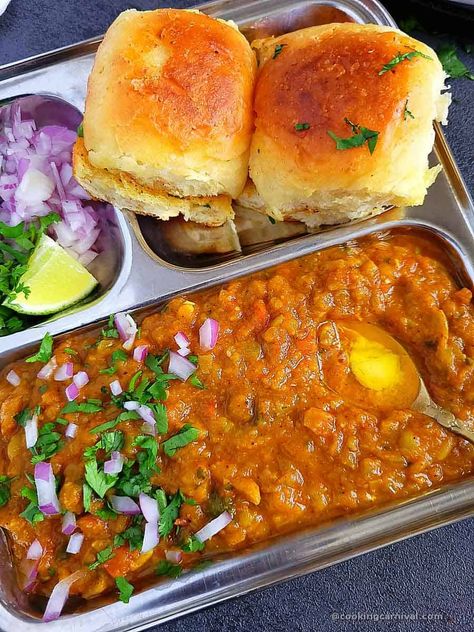 Flavorful, hearty, utterly scrumptious, and one of the most popular Indian Street Food – Pav Bhaji! It is a spicy mashed vegetable dish, served piping hot with a dollop of butter, diced red onions, cilantro, a squeeze of lime, and buttery toasted pav on the sides. Is your mouth watering yet? Mine sure is. This recipe is a treat to your eyes, tongue, tummy, and soul! 🙂 #pavbhaji #bhaji #ladipav #pavbread #mumbai #india #streetstyle Street Indian Food, Good Indian Food, South Indian Street Food, Indian Food Dishes, Yummy Food Indian, Yummy Indian Food, Food Cravings Indian, India Street Food, Street Food Indian