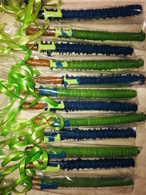 Dino Pretzel Rods, Blue And Green Dinosaur Party, Dinosaur Chocolate Covered Pretzels, Dinosaur Pretzel Rods, Blue Pretzel Rods, Green Pretzels, Dino Theme, Green Snacks, Puppy Dog Pals