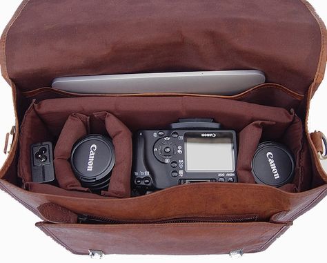 Leather messenger bag-style camera bags don't come cheap. A cursory search on B&H Photo will reveal prices that often run in the $300+ range for something Europe Planning, Dslr Bag, Camera Bag Purse, Dslr Camera Bag, Photography Bags, Canvas Leather Bag, Brown Leather Satchel, Mk Purse, Leather Camera Bag