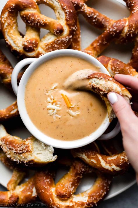 This creamy pub-style beer cheese dip is an easy appetizer recipe that's ready in 15 minutes. Use lager-style beer or your favorite variety. Best Christmas Appetizers, Beer Cheese Dip, Homemade Soft Pretzels, Apps And Snacks, Sally's Baking, Christmas Recipes Appetizers, Oktoberfest Party, Superbowl Snacks, Beer Cheese