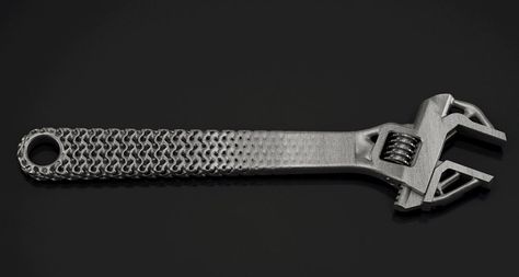 Metal 3D printed wrench demonstrating the blend between lattices and topology optimization. Photo via Frustum Topology Optimization, Metal Printing, 3d Printing Business, 3d Printing Industry, Cad Software, Additive Manufacturing, 3d Printed Objects, 3d Printed Metal, Generative Design