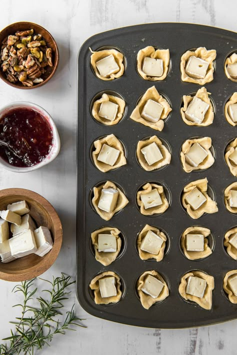 Cranberry Brie Bites (Recipe + Video) - Yellow Bliss Road Baked Brie Bites Crescent Rolls, Wonton Brie Appetizers, Wonton Brie Cups, Baked Brie Cups, Brie Cheese Crescent Rolls, Crescent Roll Brie Appetizer, Brie Bites Crescent Rolls, Book Club Snacks Appetizers, Book Club Appetizers