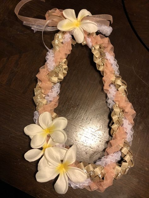 Braided ribbon lei with plumerias Hawaiian Ribbon Lei, Graduation Ribbon Leis, Lolly Necklace, Braided Ribbon Lei, Leis For Graduation, Grad Leis, Graduation Leis Diy Ribbons, Money Lei Diy, Graduation Leis Diy