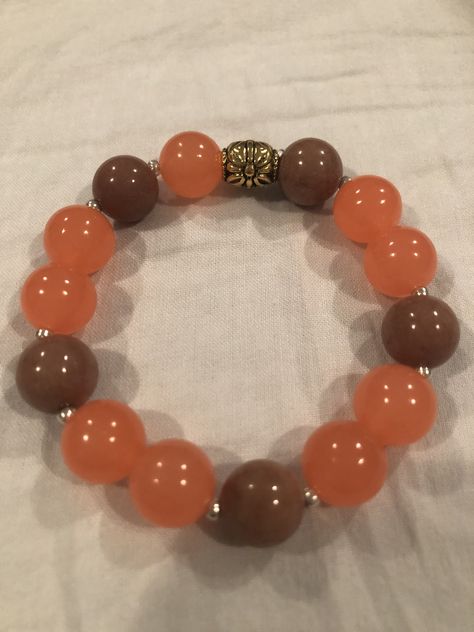 Beautiful handmade bracelets $15 each visit bracelets by Margaret on Facebook and instagram Bracelets Ideas, Bracelets Beaded, Orange Bracelet, Bead Charms Diy, Bracelets Diy, Beaded Bracelets Diy, Natural Beads, Clay Beads, Diy Bracelets