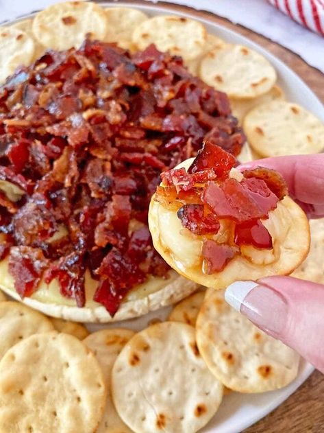 This Baked Maple Bacon Brie recipe is the appetizer your guests will be talking about for months to come! The combination of melting, creamy brie cheese with salty, sweet, savory bacon topping is incredible.It’s not only easy to make, but you can prepare it in advance and heat it just before the party. I love to make this for brunch, too, or add it to a charcuterie board. If you love the flavor of maple bacon, you are going to love this easy, cheesy spread! If you love combining the… Maple Bacon Baked Brie, Bacon Brie Appetizer, Bacon Brie Crescent Wreath, Maple Bacon Brie, Brie Crescent Wreath, Bacon Baked Brie, Bacon Brie, Baked Brie Appetizer, Creamy Brie