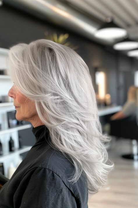 From the feathered long layered haircut on grey hair you see here to multi-dimensional silver tresses, there are many beautiful long layered hair cuts for women over 50. Tap for 40+ elegant long layered hair ideas and follow us for more hairstyles and hair color inspo! Layered Long Grey Hairstyles, Long Layered Hair Grey, Long Silver Hair Styles For Women, Gray Long Layered Hair, Hair Cuts Ideas Long Layers, Gray Hair Layered Hairstyles, Long Layered Grey Hair Over 50, Butterfly Haircut Grey Hair, Long Layers Gray Hair