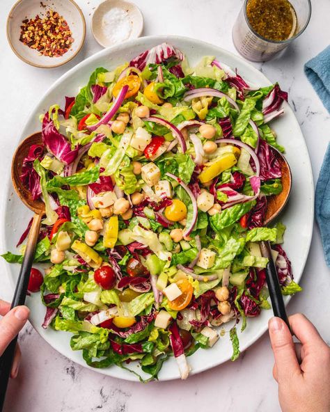 Vegetarian Italian Chopped Salad Credit: Photo: Shelly Westerhausen Credit: Photo: Shelly WesterhausenMy family has pizza night once a week. Some weeks we make pizza from scratch, other weeks we order delivery, and, yes, sometimes we put frozen pizzas into the oven and call it dinner. An excellent side dish or salad (and, let’s be honest, a nice glass of wine) can elevate any and all pizza nights just enough to make it feel like a nice meal you planned — rather than one that just sav Pizza Side Salad, Best Salad To Serve With Pizza, Salad With Pizza Side, Salad To Go With Ribs, Sides To Go With Pizza, Pizza Party Side Dishes, Salad With Pizza, What To Serve With Pizza, Pizza Side Dishes