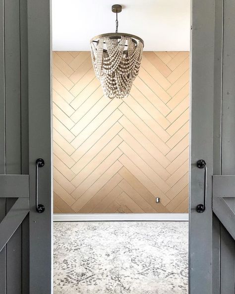 herringbone wood accent wall with beaded chandelier overhead Our Faux Farmhouse, Herringbone Accent Wall, Faux Farmhouse, Herringbone Wall, Herringbone Wood, Office Remodel, Wood Accent Wall, Home Renovations, Calming Colors