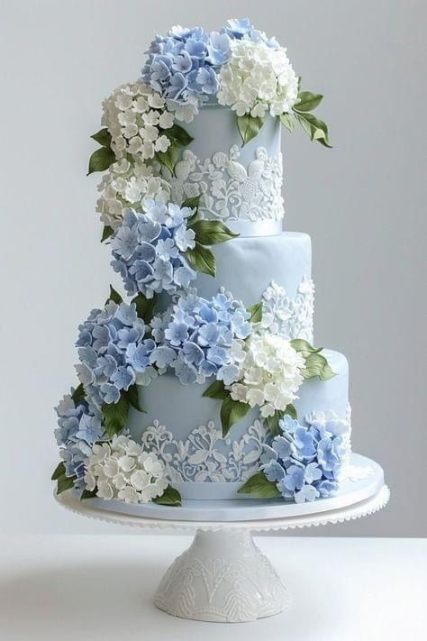 Wedding Cake Designs Colorful, Hydrangea Cake Wedding, Blue Flower Wedding Cake, Blue Hydrangea Cake, Baby Blue Wedding Cake, Blue Flowers Cake, Wedding Cake With Blue Flowers, Blue Wedding Cake Ideas, Hydrangea Cakes